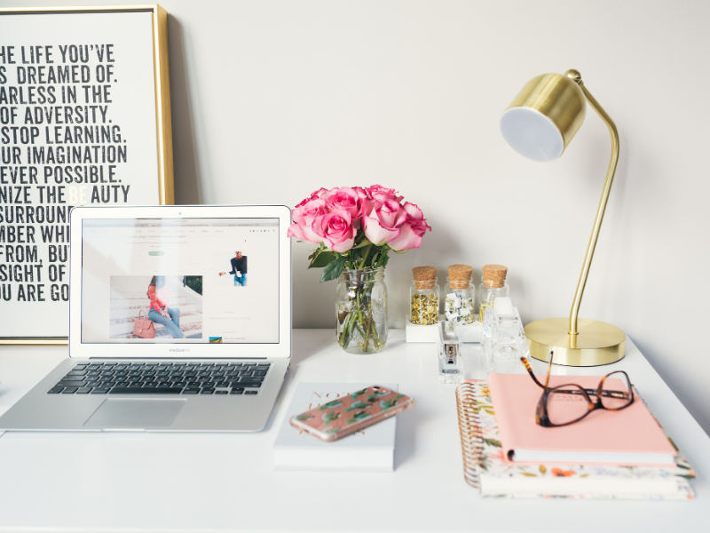 pretty white desk top with laptop, gold lamp, notebooks and glasses, how to start a blog and make money | how to make money blogging for beginners | types of blogs that make money | how to start a blog for free and make money | can you make money blogging in 2020 | how to make money by blogging