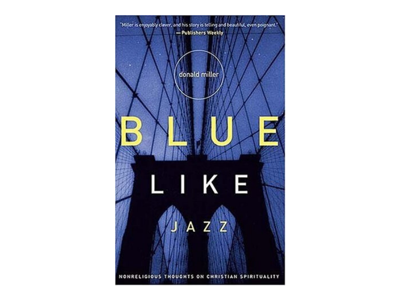 book entitled blue like jazz by donald miller, dark blue cover with bridge, memoir, donald miller